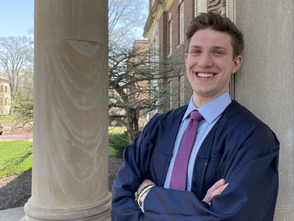 graduate outside Steidle building